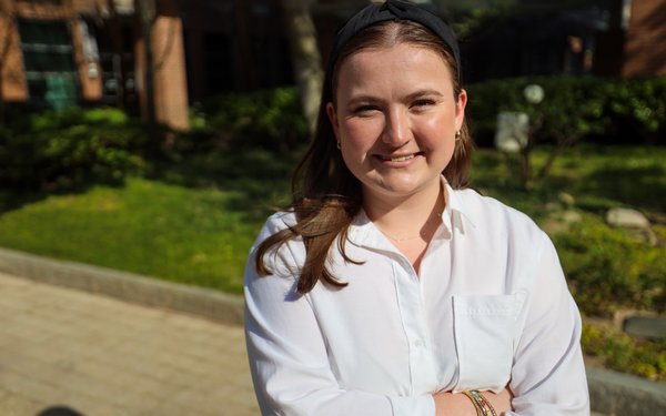 AnnMarie Hasty poses outside the Georgia Experience Center