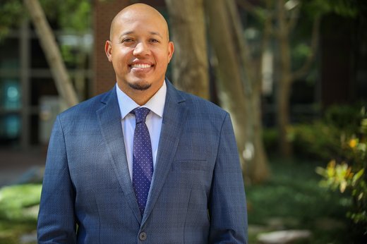 Arthur Tripp, Jr. poses outside