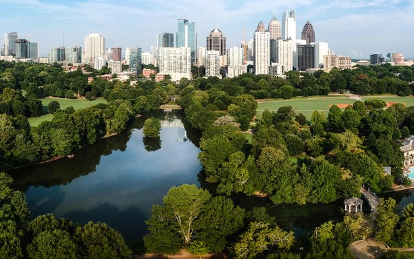 Skyline view of Atlanta displaying a vast array of trees and buildings