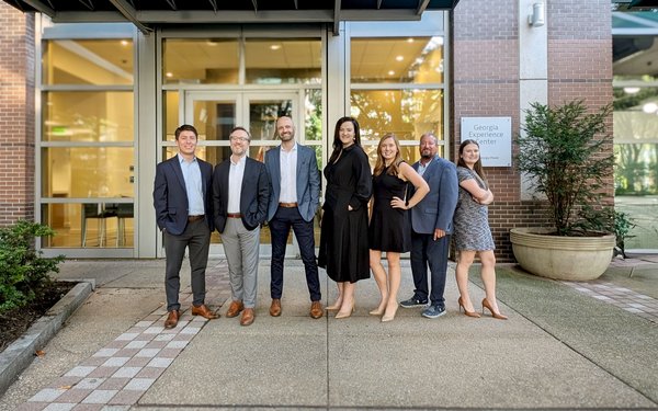 Georgia Powers statewide business recruitment team stands together in front of their offices in tech square in Atlanta