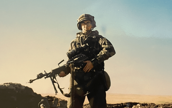 Young Paul poses in his military uniform